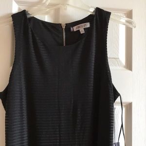 J-Lo Slinky black dress.